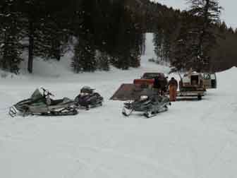 Staging snowmobiles at the ski area