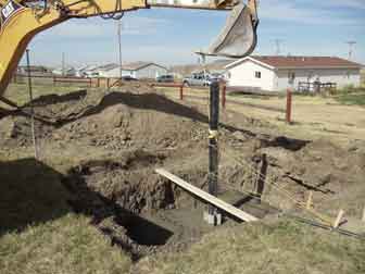 Backhoe and dish foundation